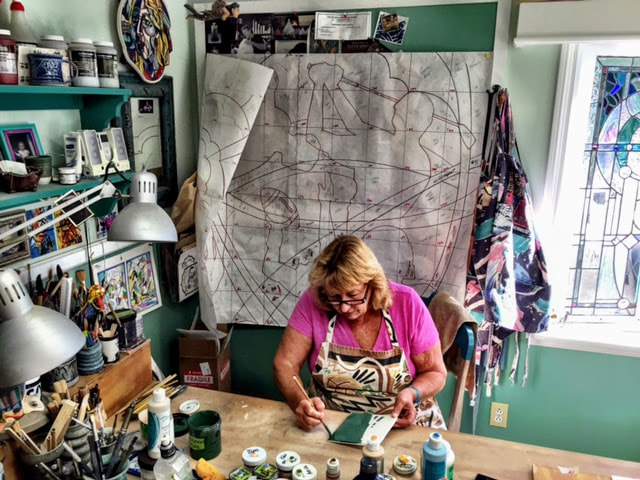 Kathryn Stovall Dennis glazing tiles in her San Clemente studio